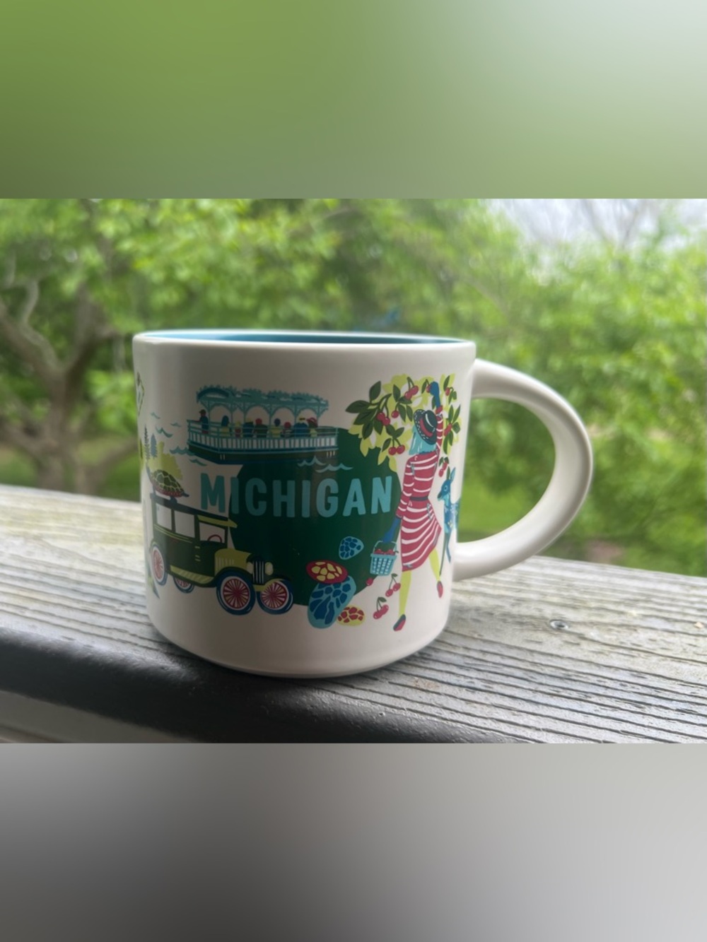 Starbucks Michigan Ceramic Mug — White with Green and Pink Details